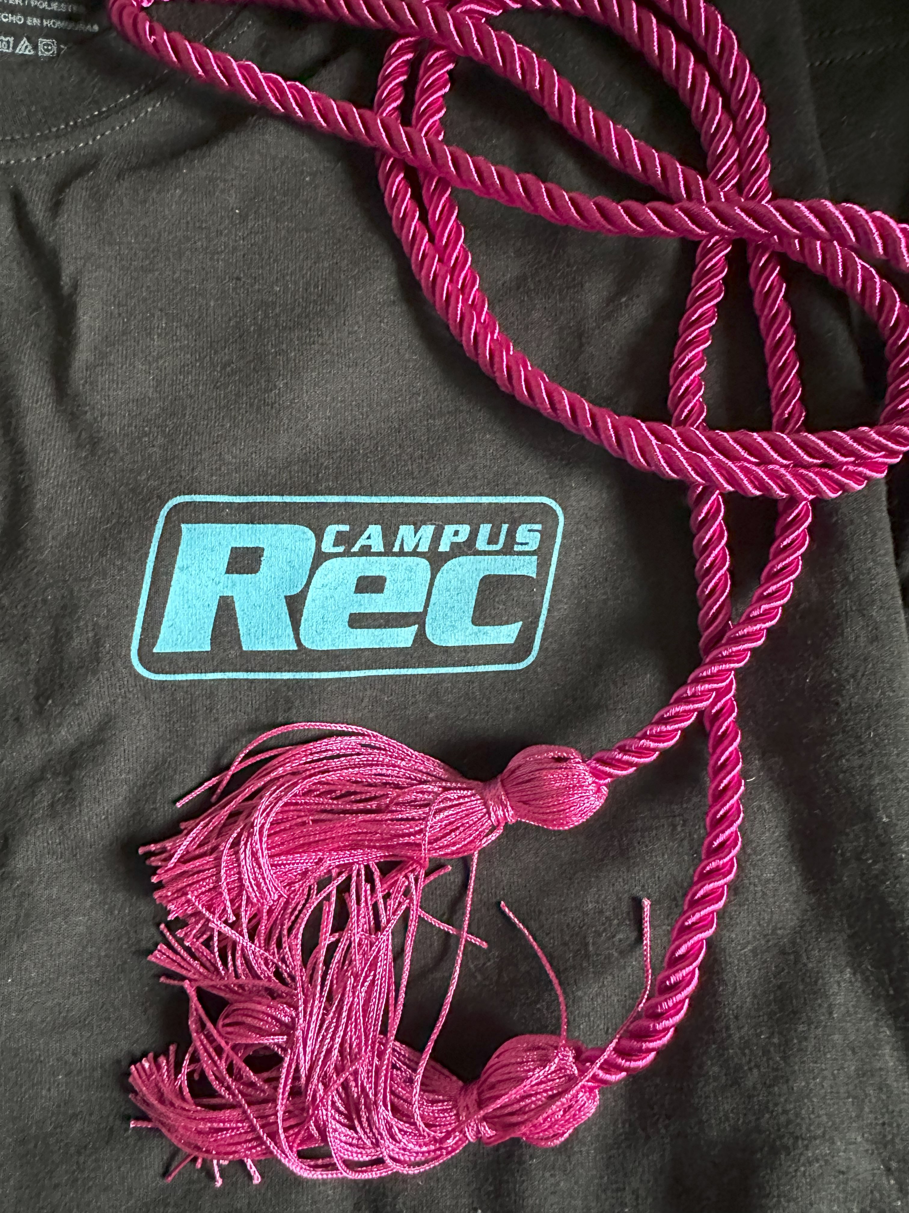 Fuchsia cord on Campus Rec sweatshirt 