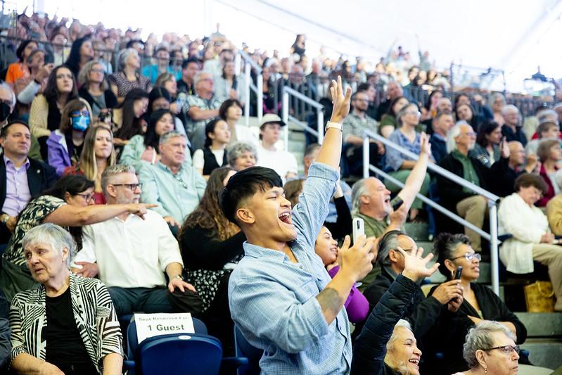 Crowd cheering at commencement ceremony